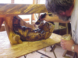 carved table in works