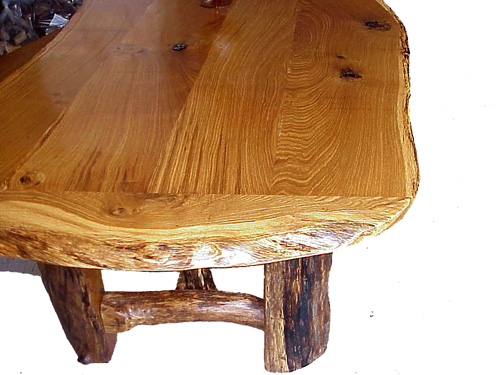 Solid, finely finished oak top and legs. It's ALL oak.