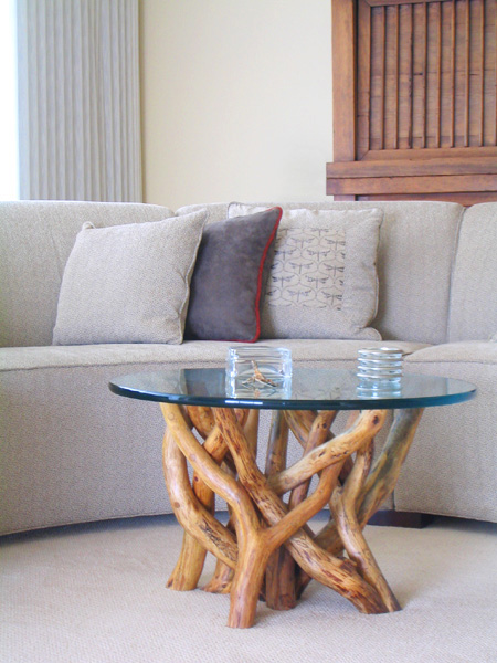 Kaplans cocktail table - round top with polished pencil edging.