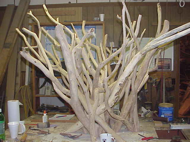 Prior to flattening and leveling.. branches stick EVERYWHERE.. 