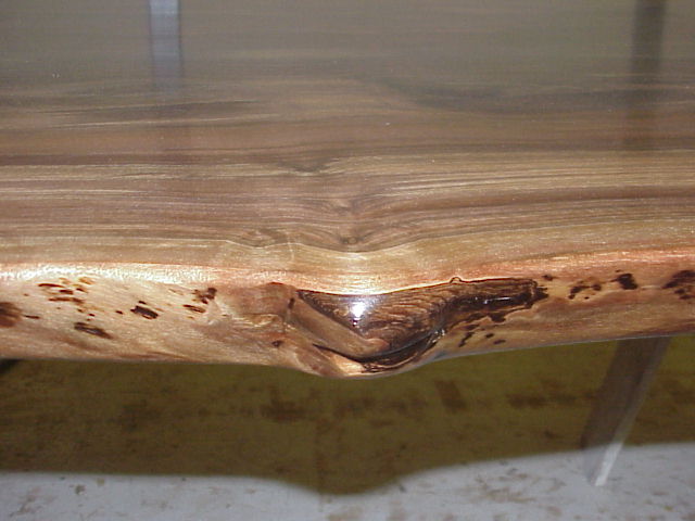 Natural or  live  edge, as some refer to it. 